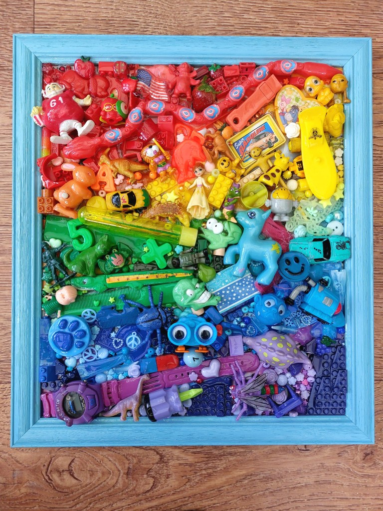 Photo of upcycled plastic toy art piece
